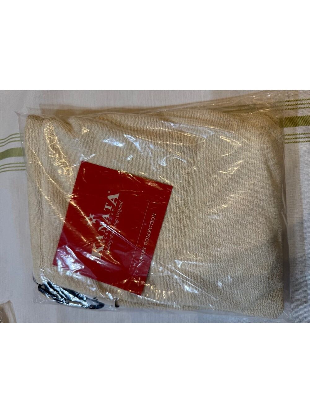 KANATA light-colored fleece or travel blanket from the Kanata Blanket Co.